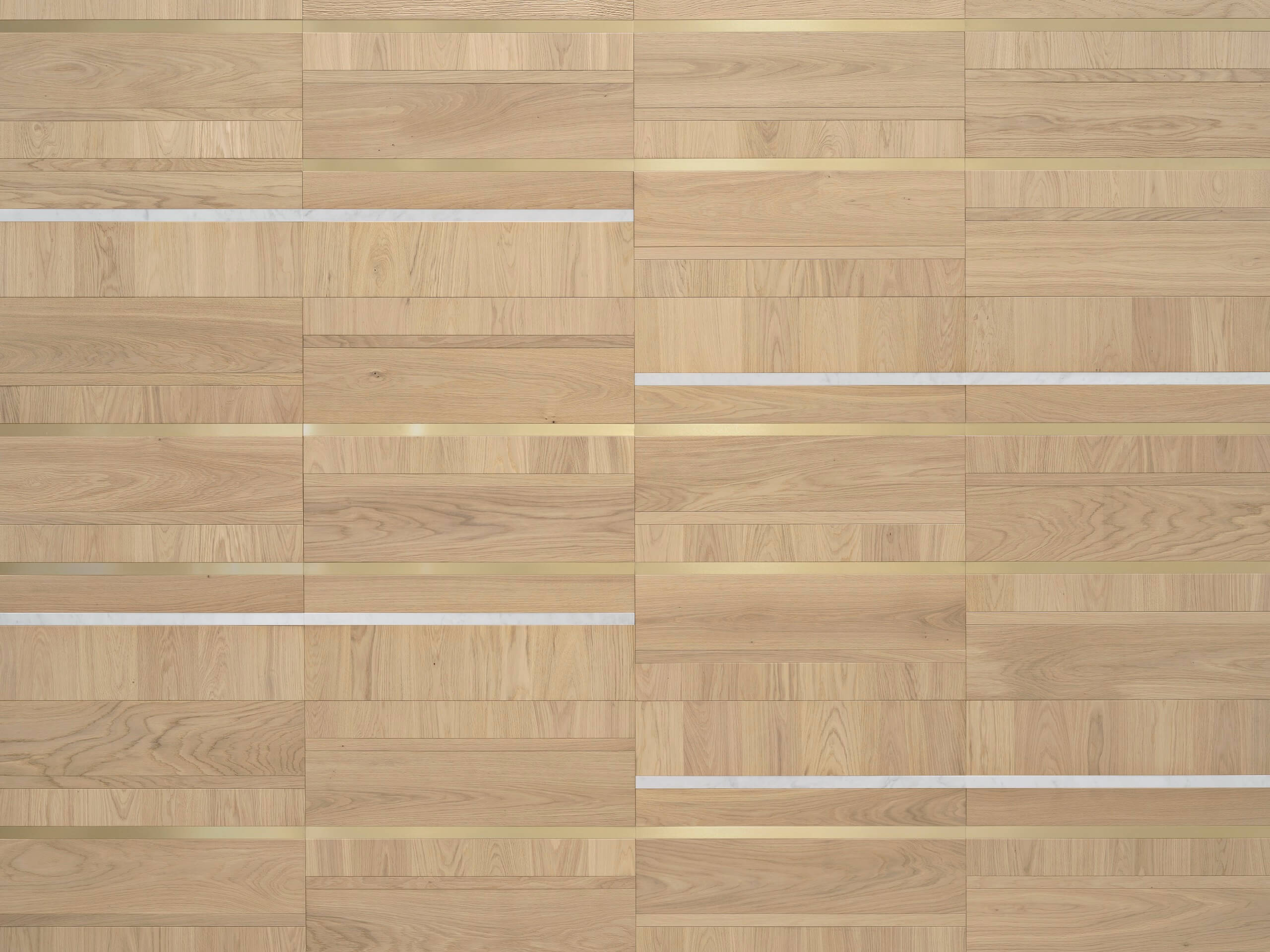 Regolo modular floor in Walnut or Oak wood.