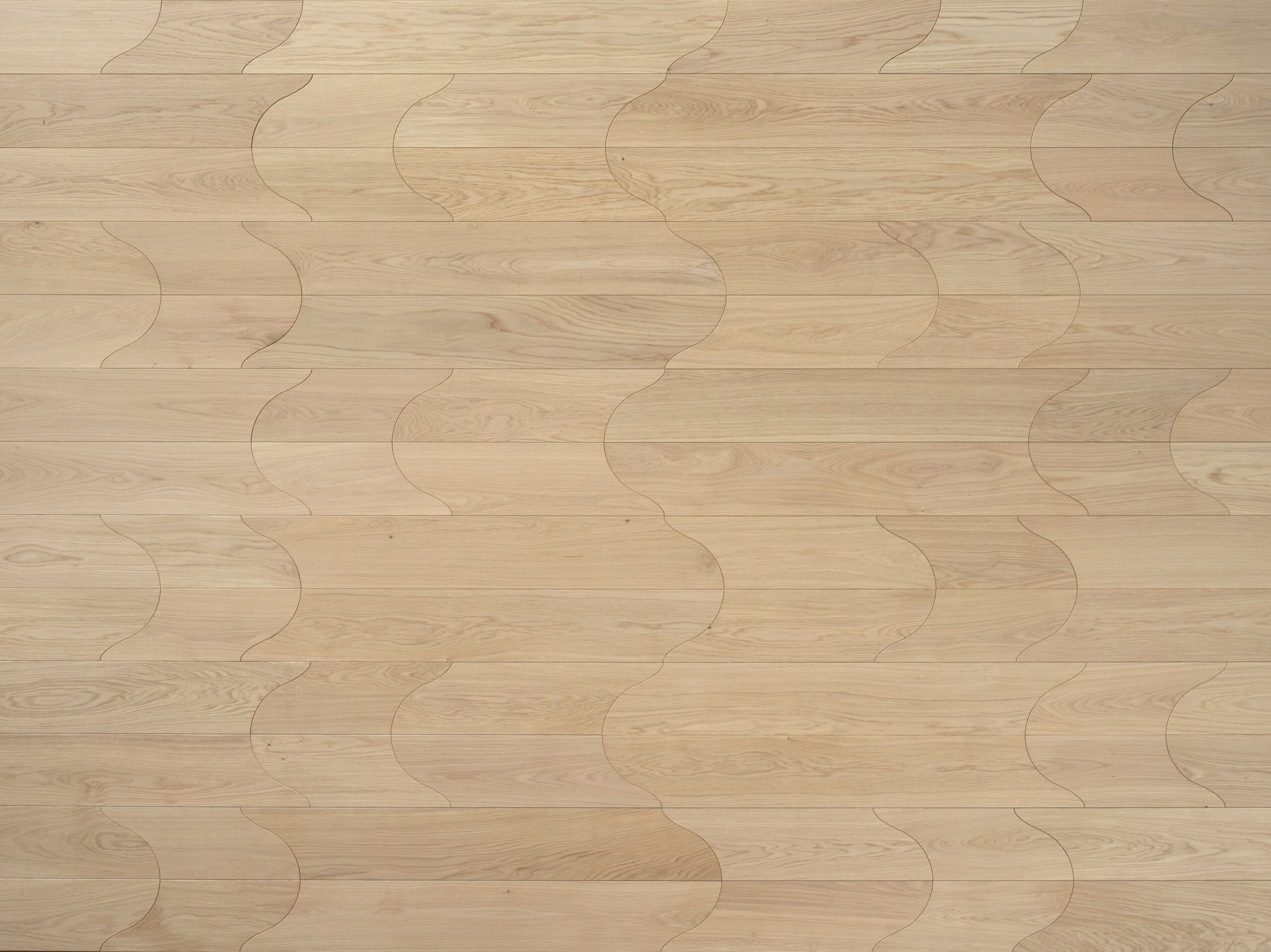 Unda modular floor in Walnut or Oak wood.