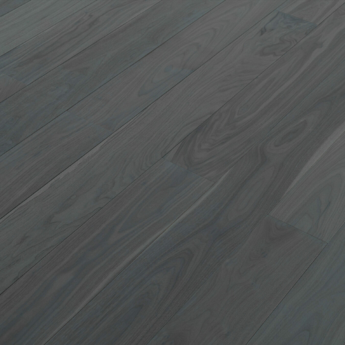 Engineered wood planks floor in American Walnut, brushed, stained, varnished.