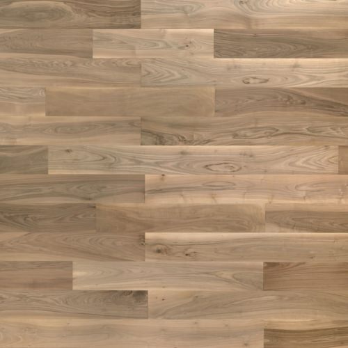 Engineered wood planks floor in European Walnut: brushed, stained, varnished.