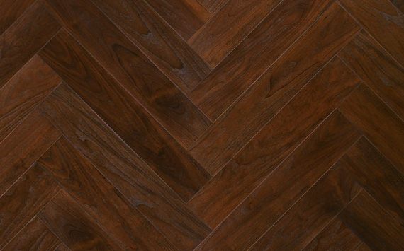 Herringbone 90° wood floor in American Walnut: brushed, stained, varnished.