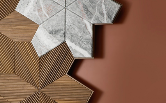 Modular boiserie Azalea 3D, is a contemporary wood cladding with marble and metal inserts.