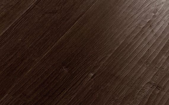 Engineered wood planks floor in Oak: hand planed, stained, waxed.